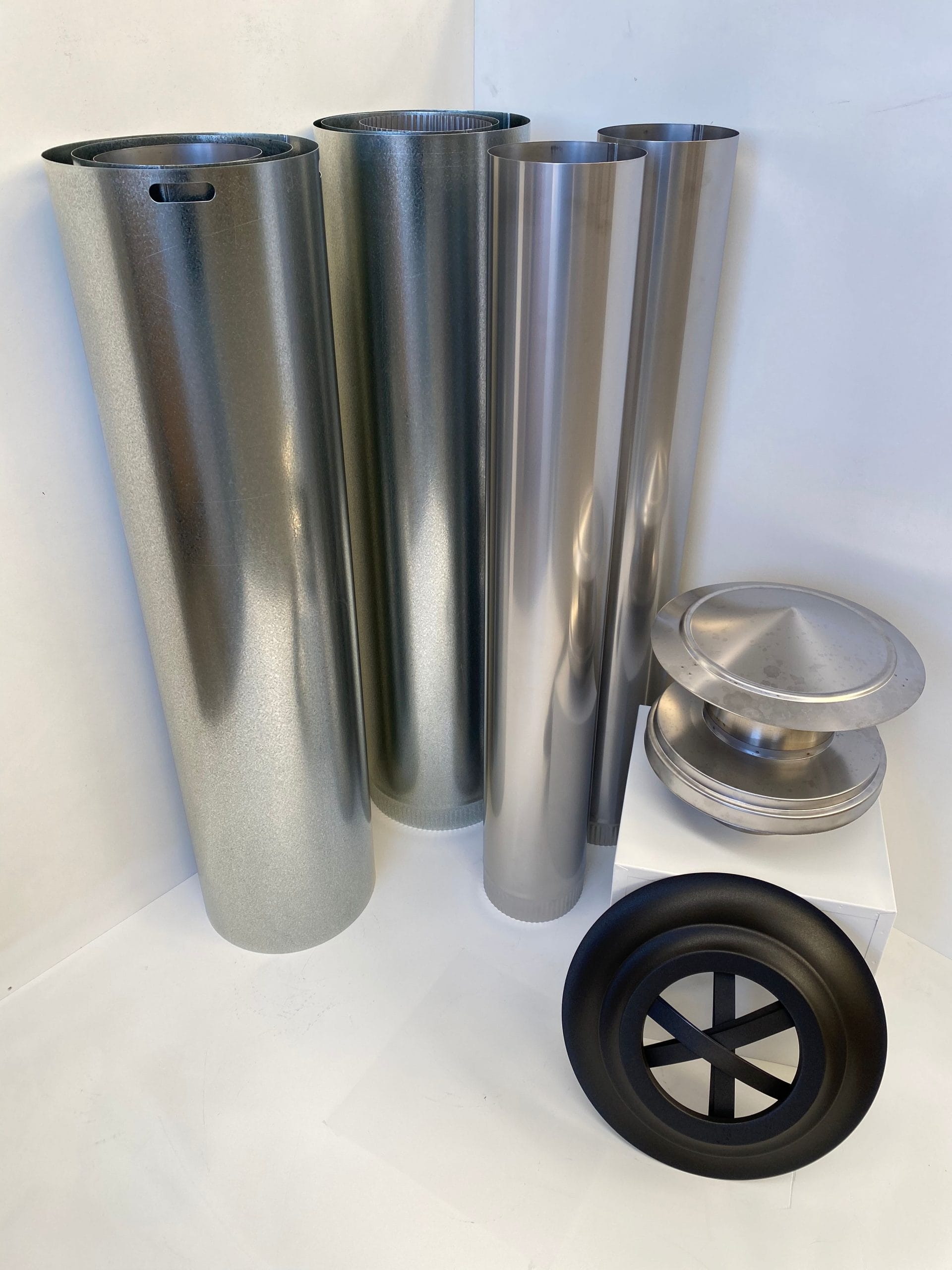 Hunter Valley Heating Signature stainless steel flue kit with connecting pipes and fittings for fireplace ventilation system.
