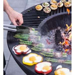 Castworks Hergóm Zenith high base fire pit complete set, outdoor fireplace with sturdy metal construction and functional design.