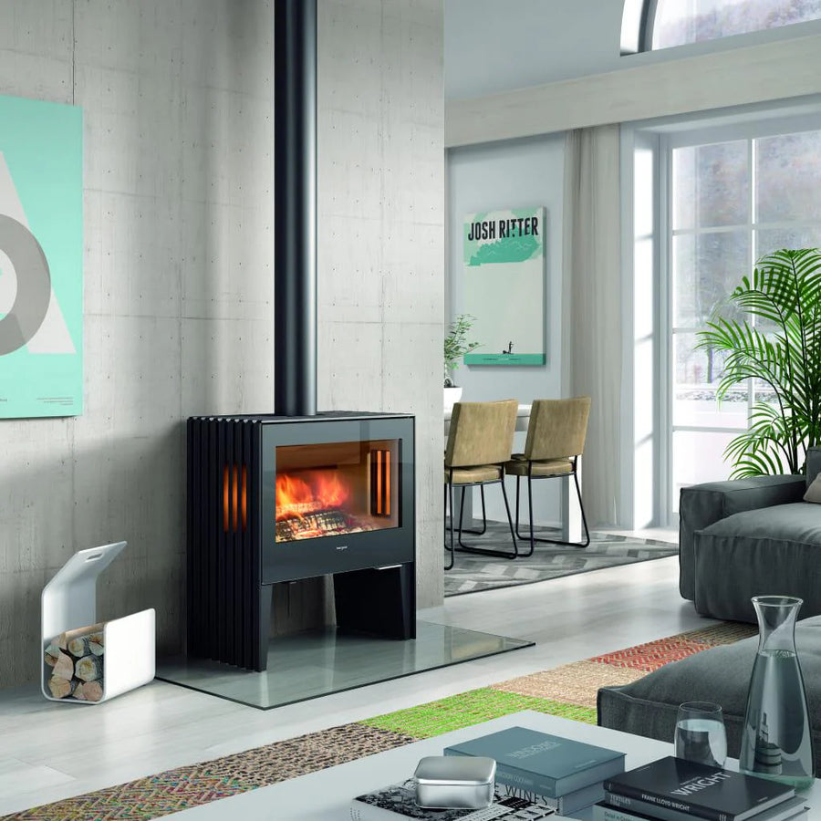Castworks Hergóm Glance L wood fireplace with sleek design and glass front, ideal for modern home heating and ambiance.
