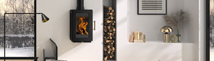 Castworks Hergóm Glow wood fireplace showing a modern, sleek fireplace with glass front and warm interior flames.
