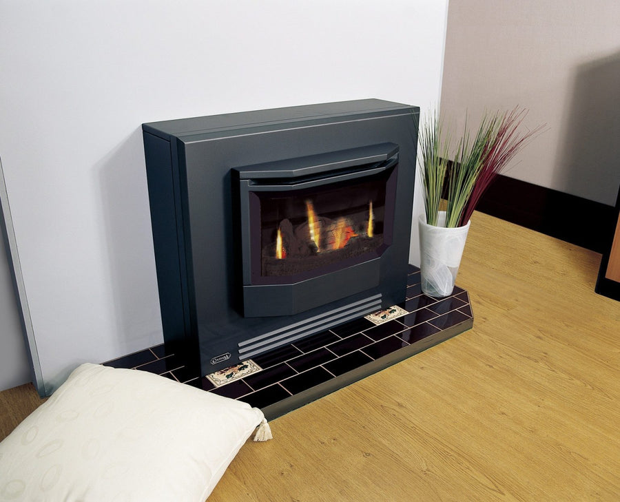 Coonara Hermitage internal fascia surround gas heater with sleek design and control panel, installed in a modern living space.