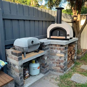 HVH60 Dome Preassembled Pizza Oven by HVH Pizza Ovens, compact outdoor pizza oven with dome design and stainless steel finish.