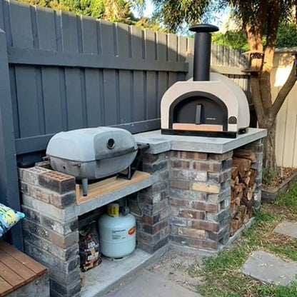 HVH60 Dome Preassembled Pizza Oven by HVH Pizza Ovens, compact outdoor pizza oven with dome design and stainless steel finish.