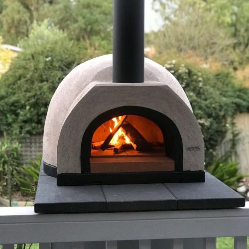 HVH60 Dome Preassembled Pizza Oven from HVH Pizza Ovens with a stainless steel dome and cooking chamber, ready for pizza baking.