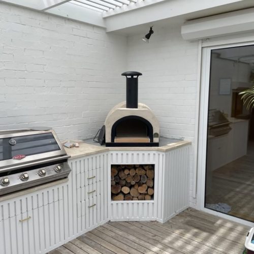 HVH60 Dome Preassembled Pizza Oven by HVH Pizza Ovens, showing the stainless steel exterior and large cooking chamber.