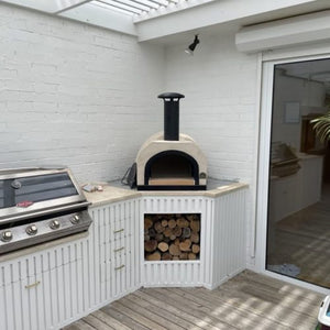 HVH60 Dome Preassembled Pizza Oven by HVH Pizza Ovens, showing the stainless steel exterior and large cooking chamber.