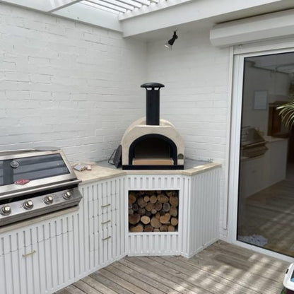 HVH60 Dome Preassembled Pizza Oven by HVH Pizza Ovens, showing the stainless steel exterior and large cooking chamber.