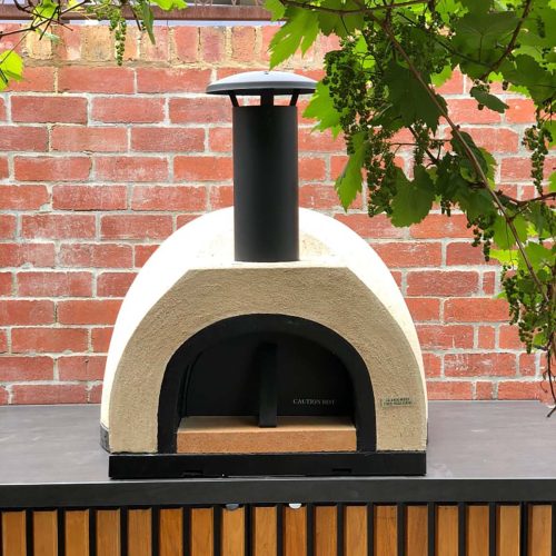 HVH Pizza Ovens HVH60 Dome Preassembled Pizza Oven with domed stainless steel exterior and compact design, ready for baking.