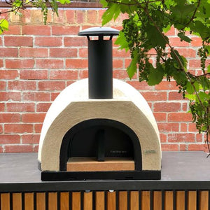 HVH Pizza Ovens HVH60 Dome Preassembled Pizza Oven with domed stainless steel exterior and compact design, ready for baking.