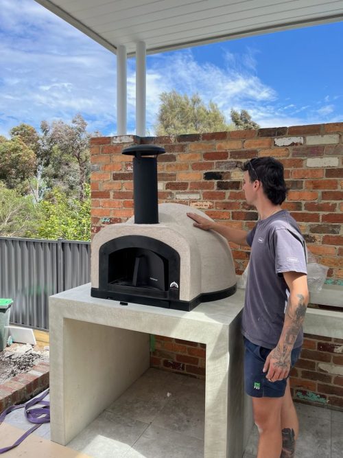 HVH70 Crema Black PVD preassembled pizza oven from HVH Pizza Ovens, designed for baking authentic pizzas.
