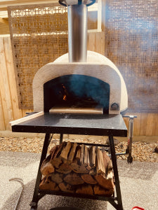 HVH70 Crema preassembled pizza oven by HVH Pizza Ovens, featuring a sleek cream exterior and compact design for authentic pizza baking.