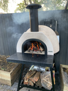 HVH Pizza Ovens HVH70 Dome Preassembled Pizza Oven with stainless steel exterior and dome lid for authentic homemade pizza.
