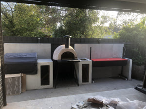 HVH70 Dome Preassembled Pizza Oven by HVH Pizza Ovens, showcasing a compact, stainless steel pizza oven with a domed cooking chamber.