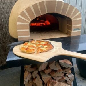 HVH70 Real Brick Preassembled Pizza Oven by HVH Pizza Ovens, showcasing the brick exterior and compact design for outdoor pizza cooking.
