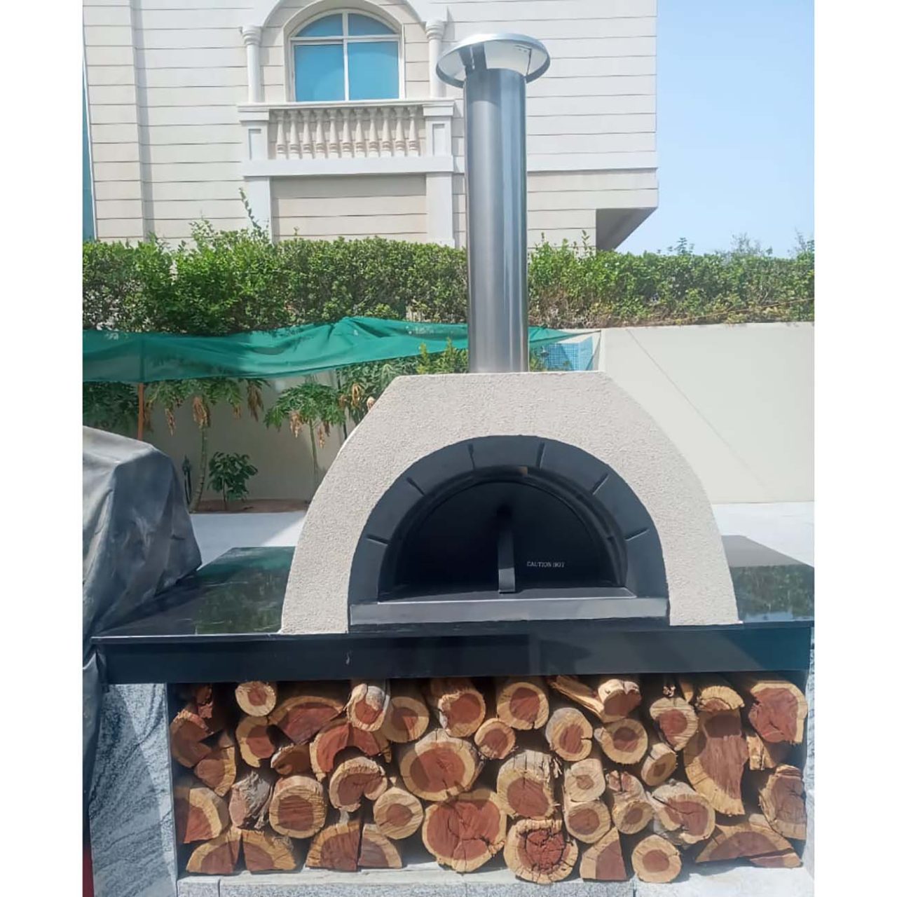HVH Pizza Ovens HVH80 Dome preassembled pizza oven with a dome design and stainless steel construction for outdoor pizza baking.