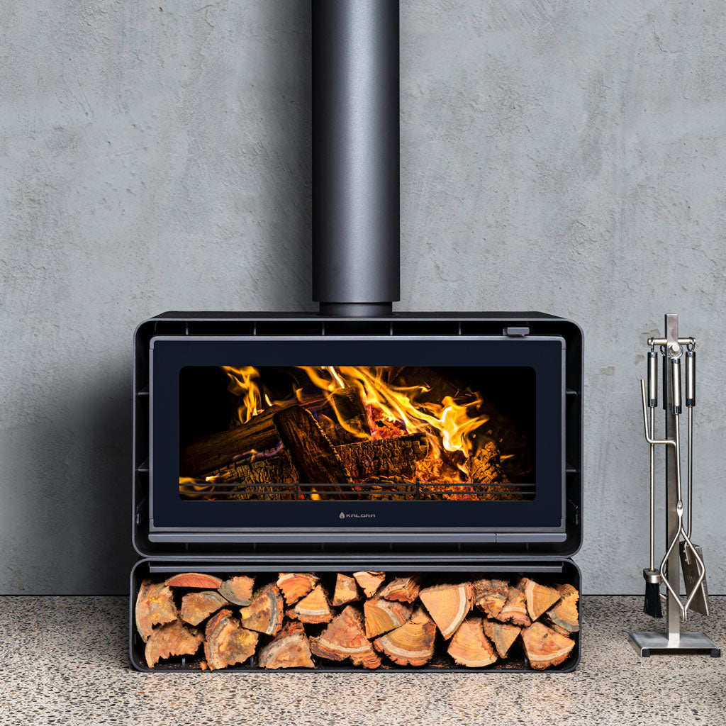 Kalora Urban LS wood fireplace with woodbox base