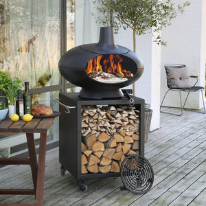 Morsø Forno Outdoor Oven Terra Set with oven, pizza stone, and accessories for outdoor cooking and baking.