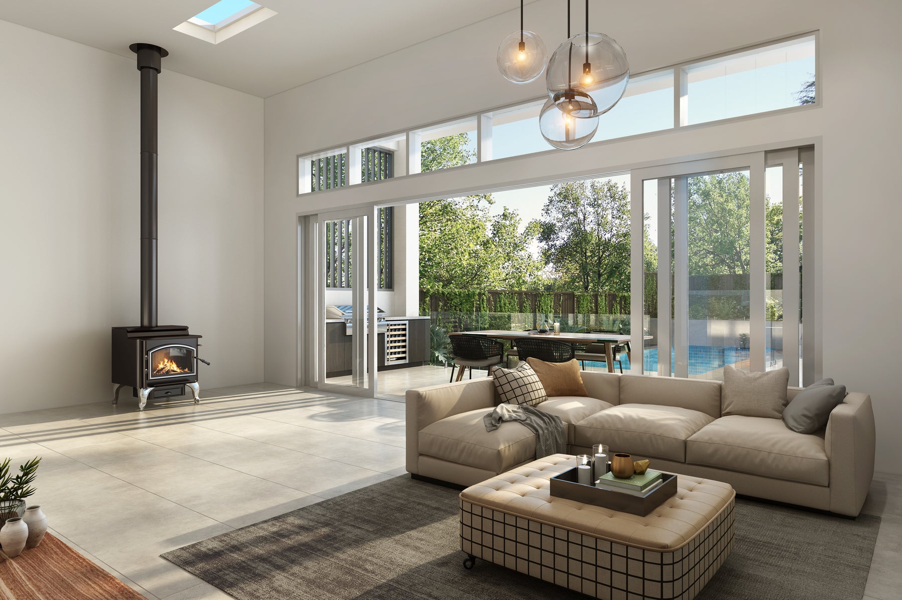 Quadra-Fire 5700 Step Top fireplace stove with a modern design, featuring a glass door and metal body in a cozy living room setting.