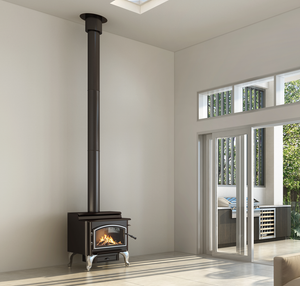 Quadra-Fire 5700 Step Top fireplace stove with black finish and glass door, designed for heating and cooking in a versatile stove.