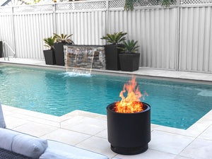 VisionLINE outdoor firepit made of stainless steel, designed for outdoor fireplaces and perfect for outdoor gathering spaces.
